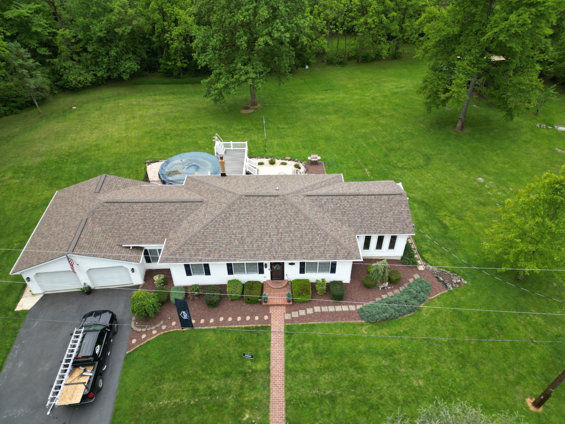 Aerial view of a completed REP roof replacement on a Pennsylvania home